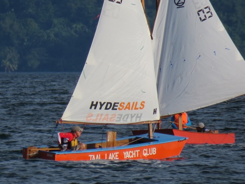 Peter singlehanded being chased by me and Lyn two up - not much difference in speed at the Oz Goose Nationals in light wind